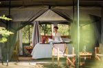 Wilderness Camp: Saruni-Basecamp-Wilderness-tent-with-guest